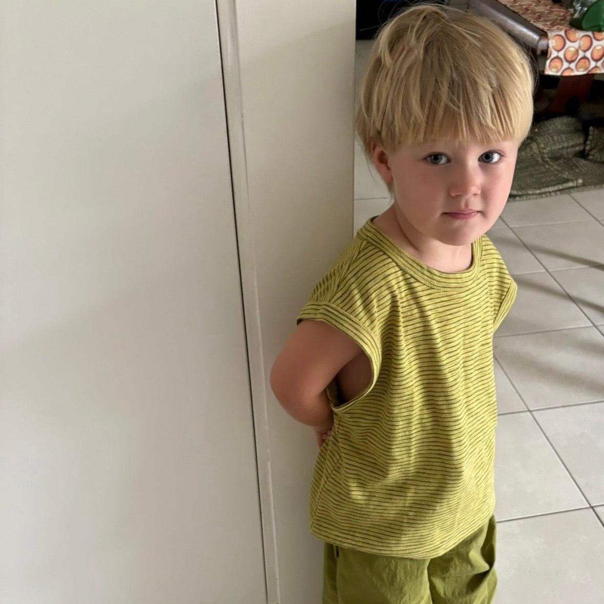 Ari wearing Summer Knit Tank in Treehouse Stripe. Age 3 • Wearing 4-5Y