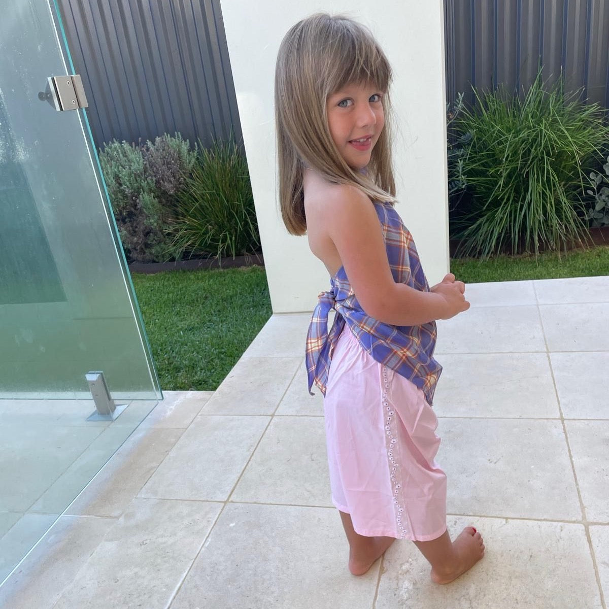 Margaux wearing Ari Scarf Top in Iris Check. Age 3 • Wearing 2-3Y