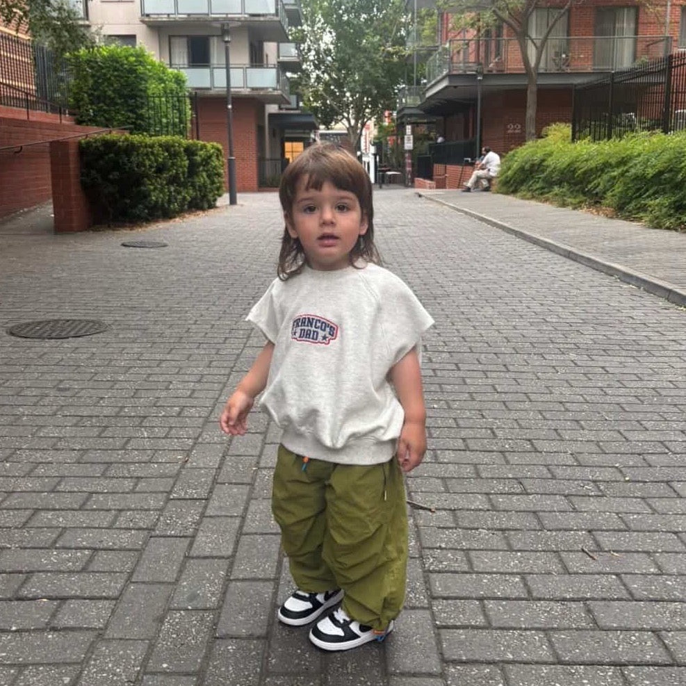 Xander wearing Tech Pant in Sprout. Age 2 • Wearing 2-3Y