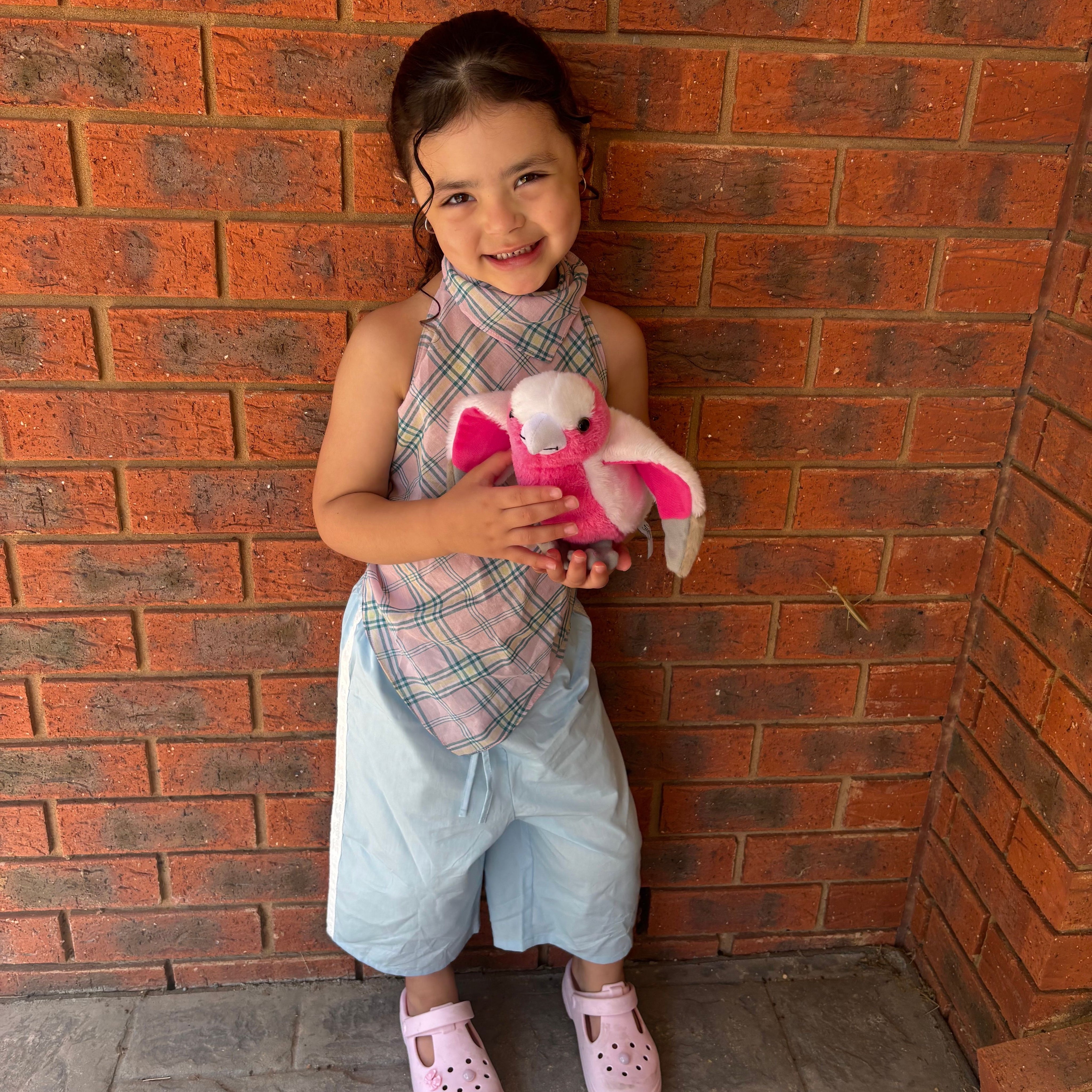 Maeve wearing Ari Scarf Top in Musk Check. Age 4 • Wearing 6-8Y