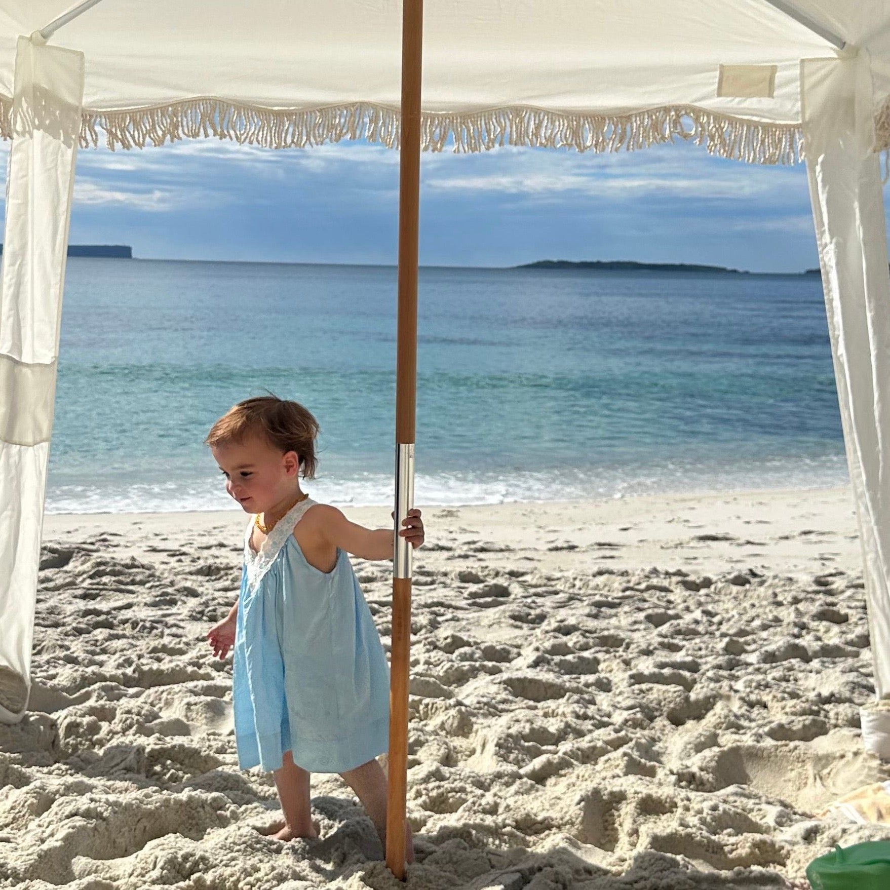 Lola wearing Polly Dress in Float. Age 2 • Wearing 12-18m