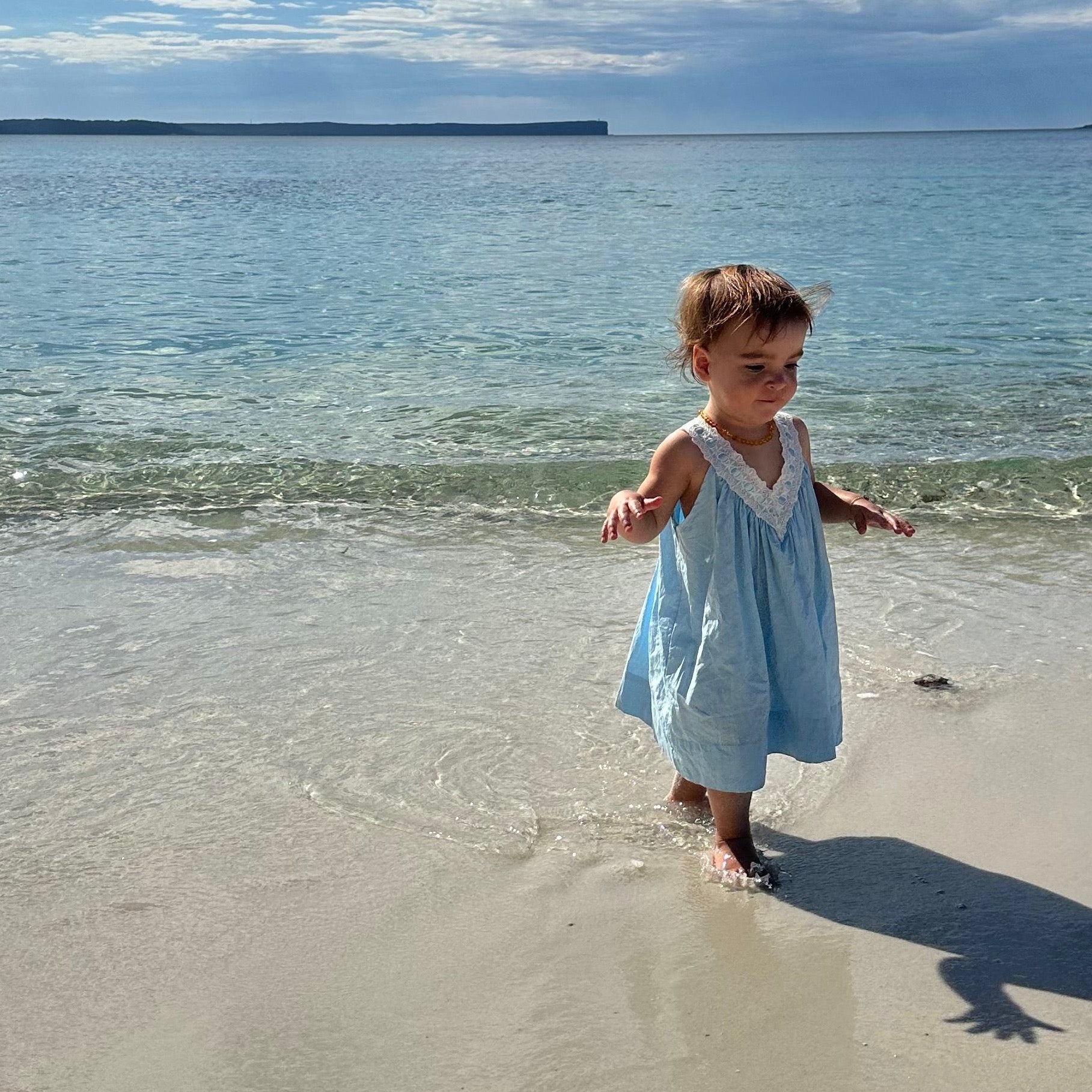 Lola wearing Polly Dress in Float. Age 2 • Wearing 12-18m