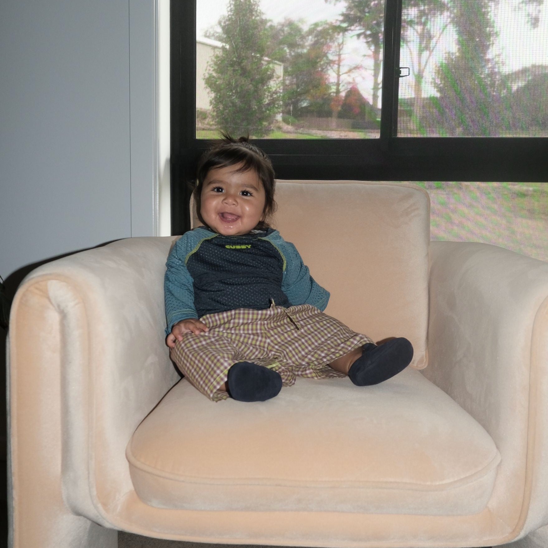 Ava wearing Bounce Tee in Orbit. Age 6-12m • Wearing 6-12m