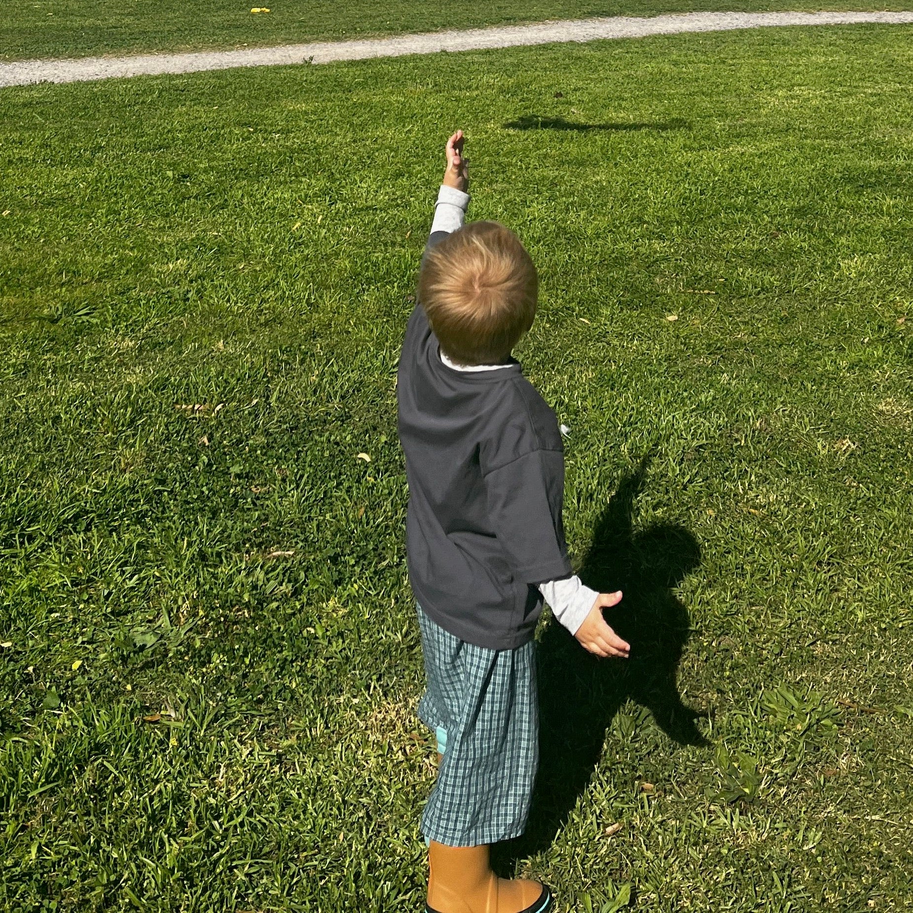 Ari wearing Frankie Long Short in Stormy Check. Age 3 • Wearing 2-3Y