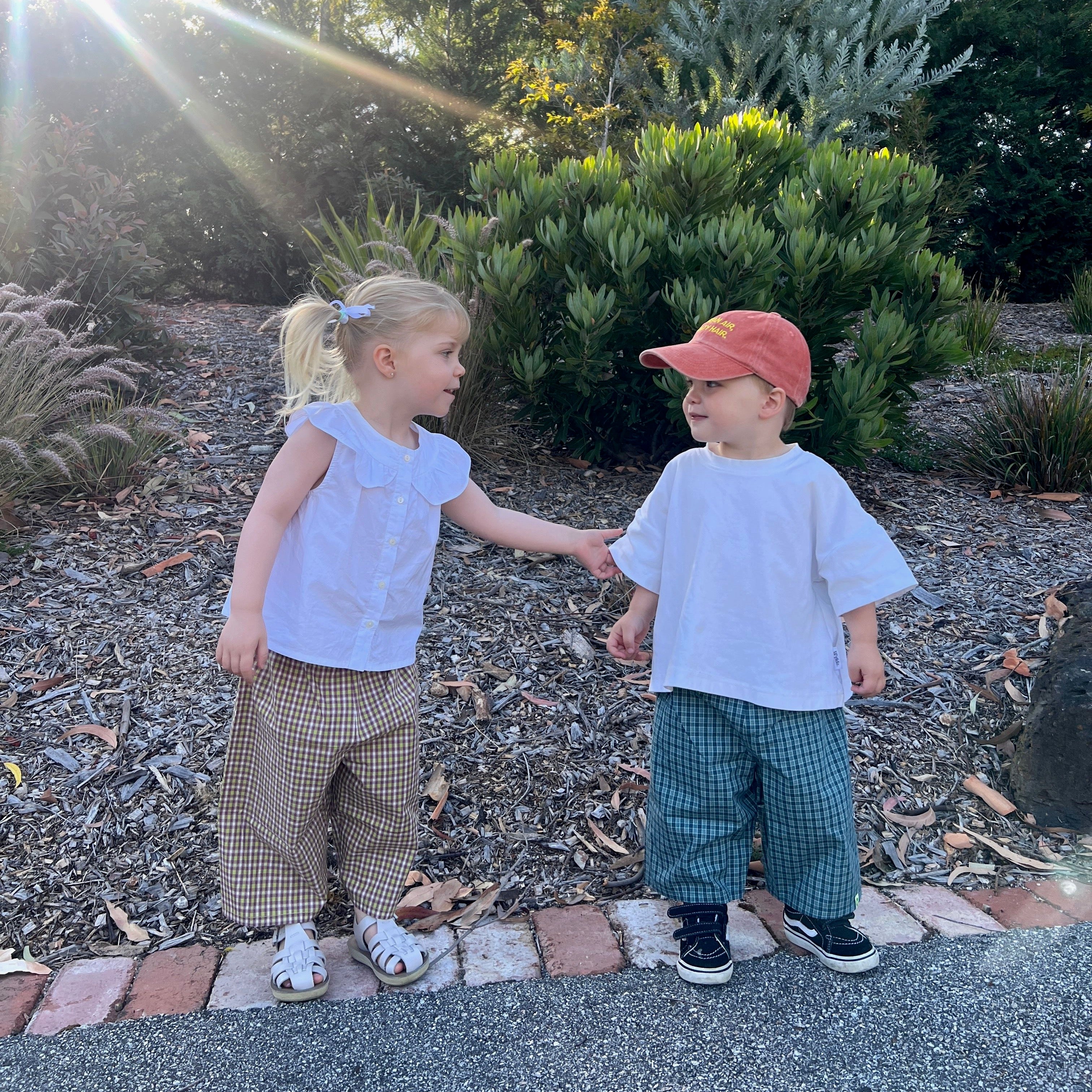 Stevie wearing Frankie Long Short in Lime Check. Age 3 • Wearing 4-5Y