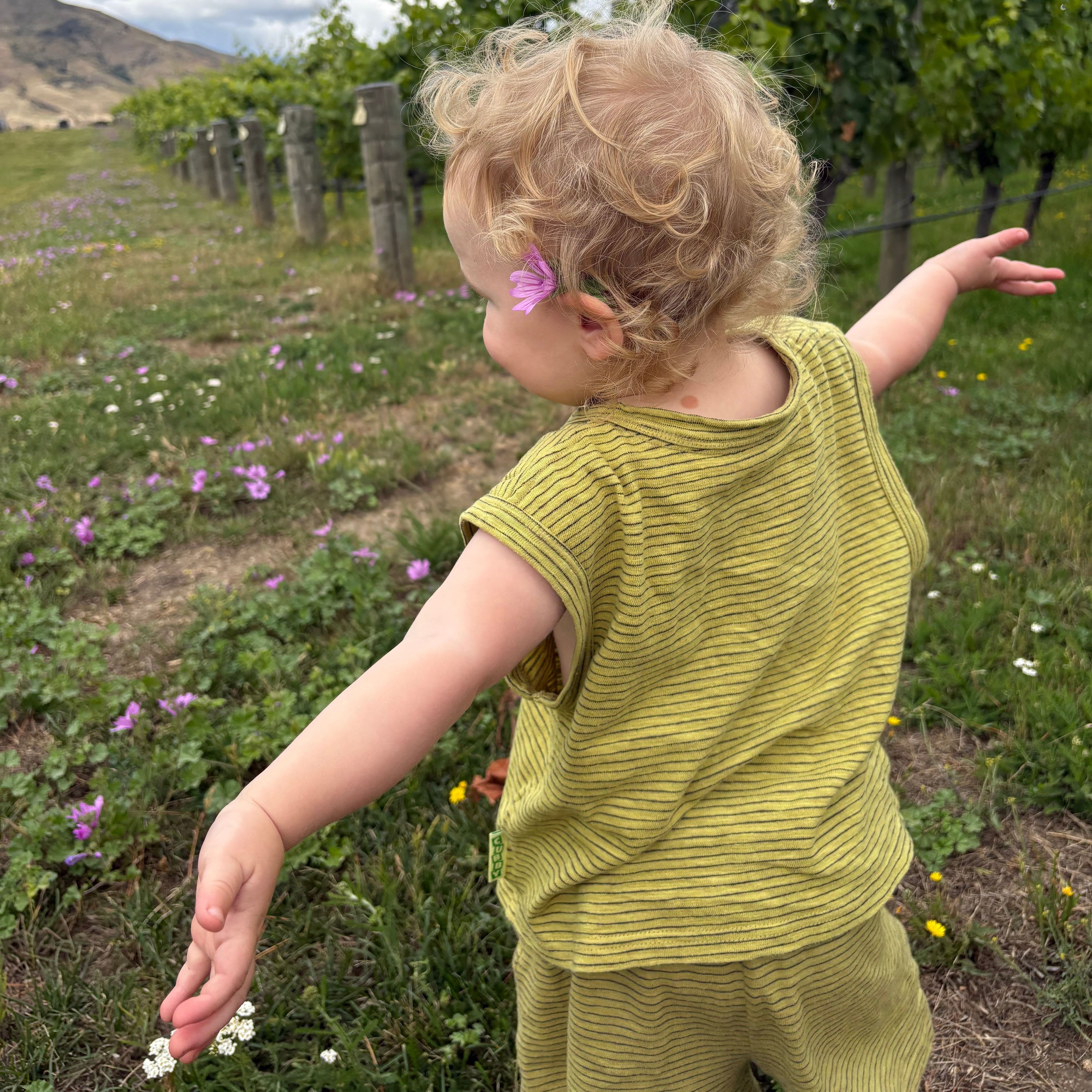 Rocco wearing Summer Knit Tank in Treehouse Stripe. Age 2 • Wearing 2-3Y