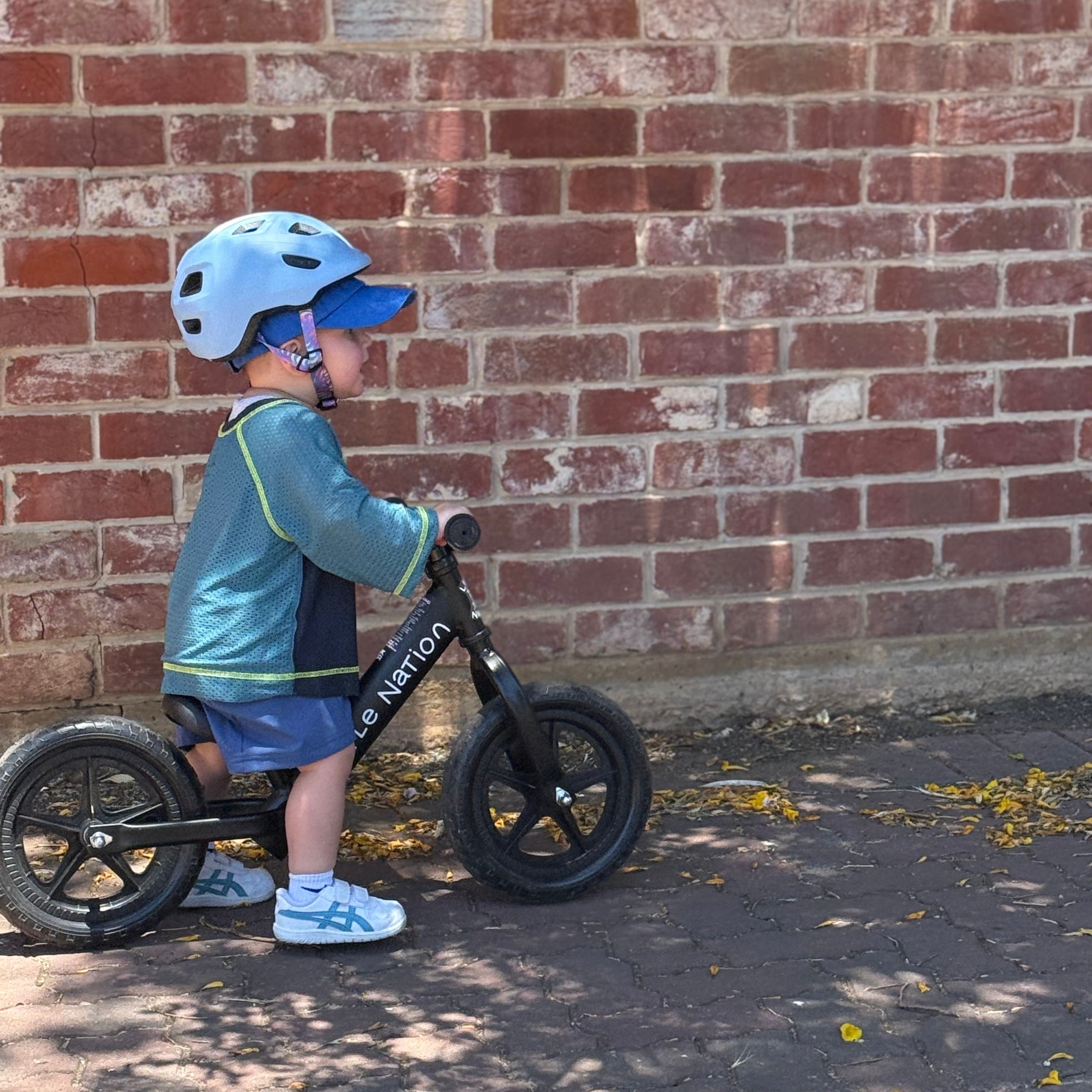 Archer wearing Bounce Tee in Orbit. Age 2 • Wearing 2-3Y
