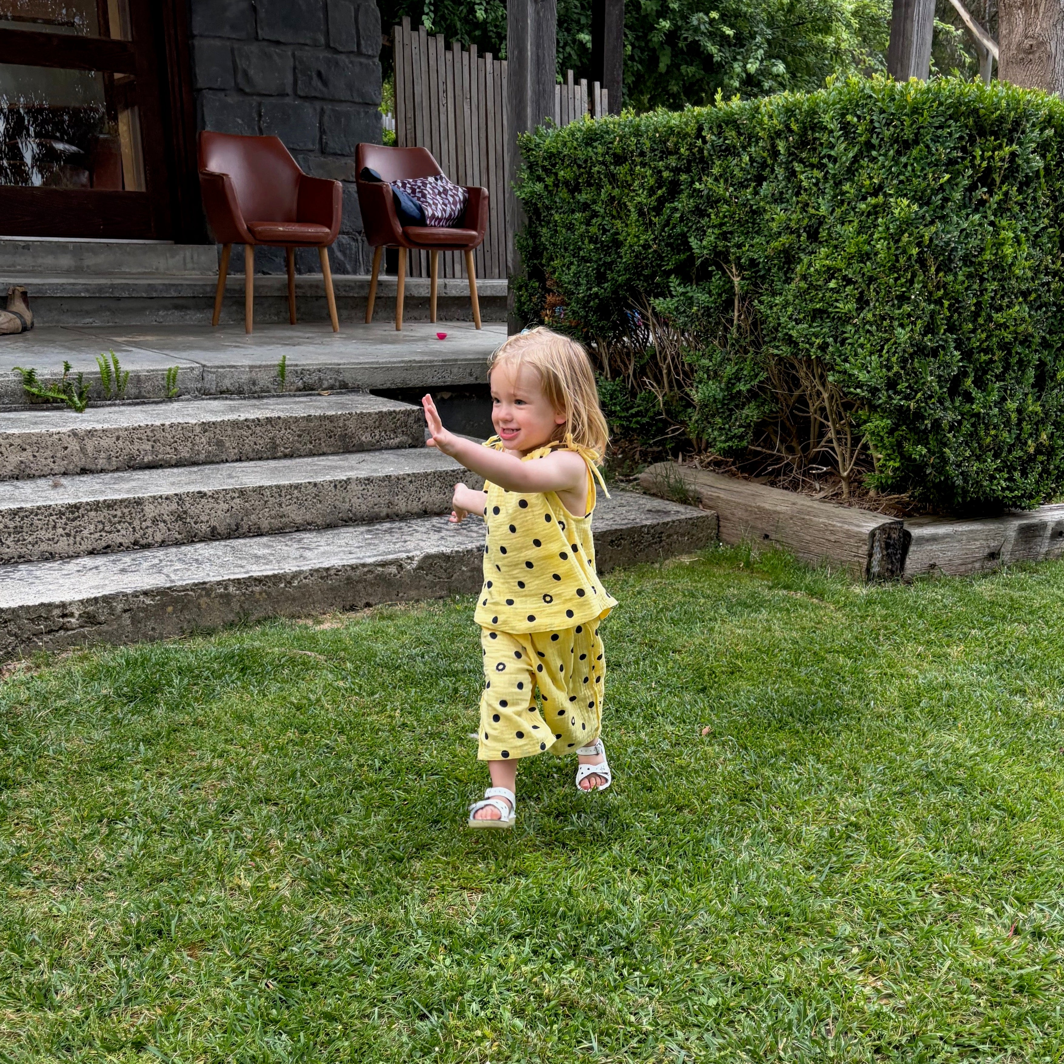 Juni wearing Lyra Lace Up Tank in Butter Dot. Age 2 • Wearing 2-3Y