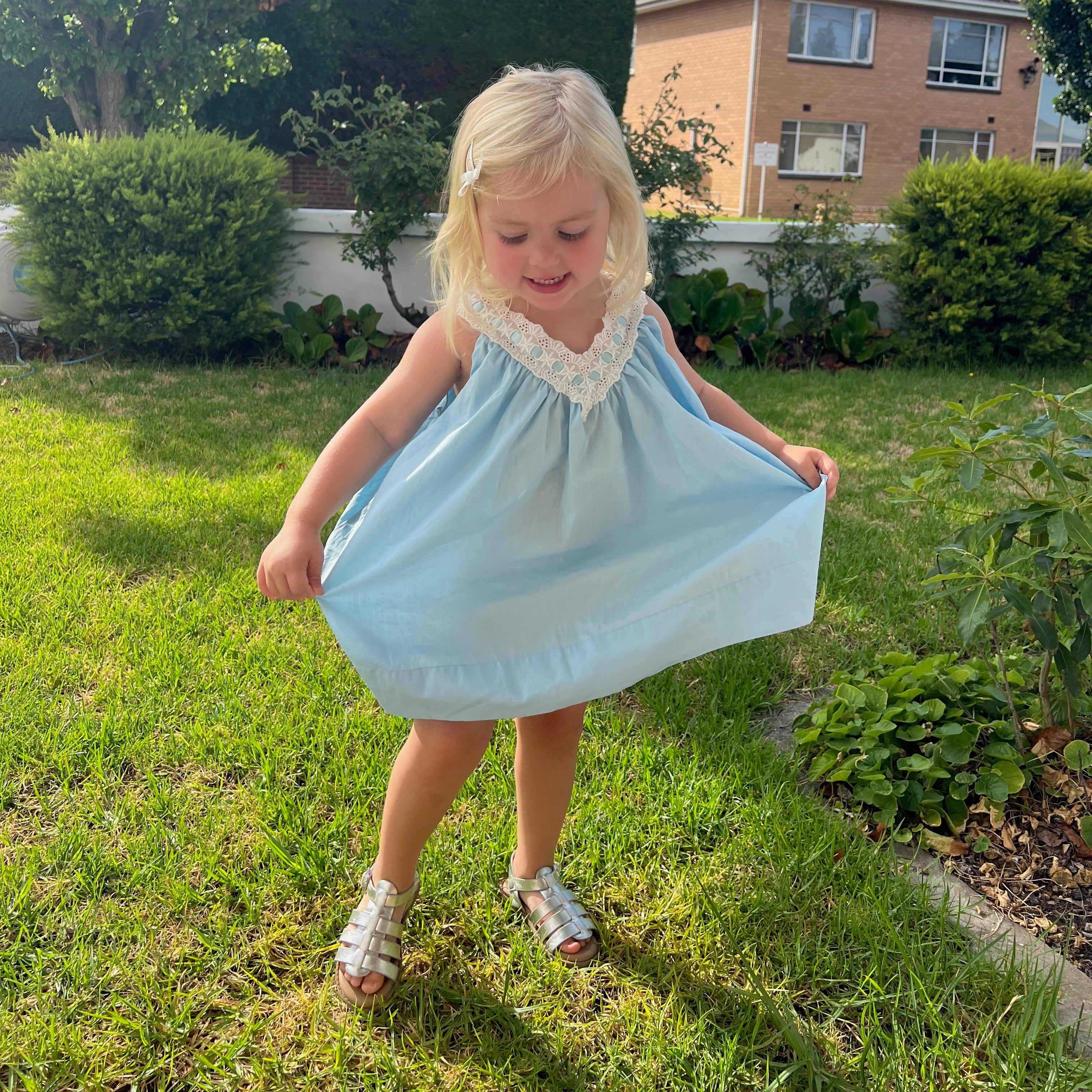 Henrietta wearing Polly Dress in Float. Age 2 • Wearing 2-3Y