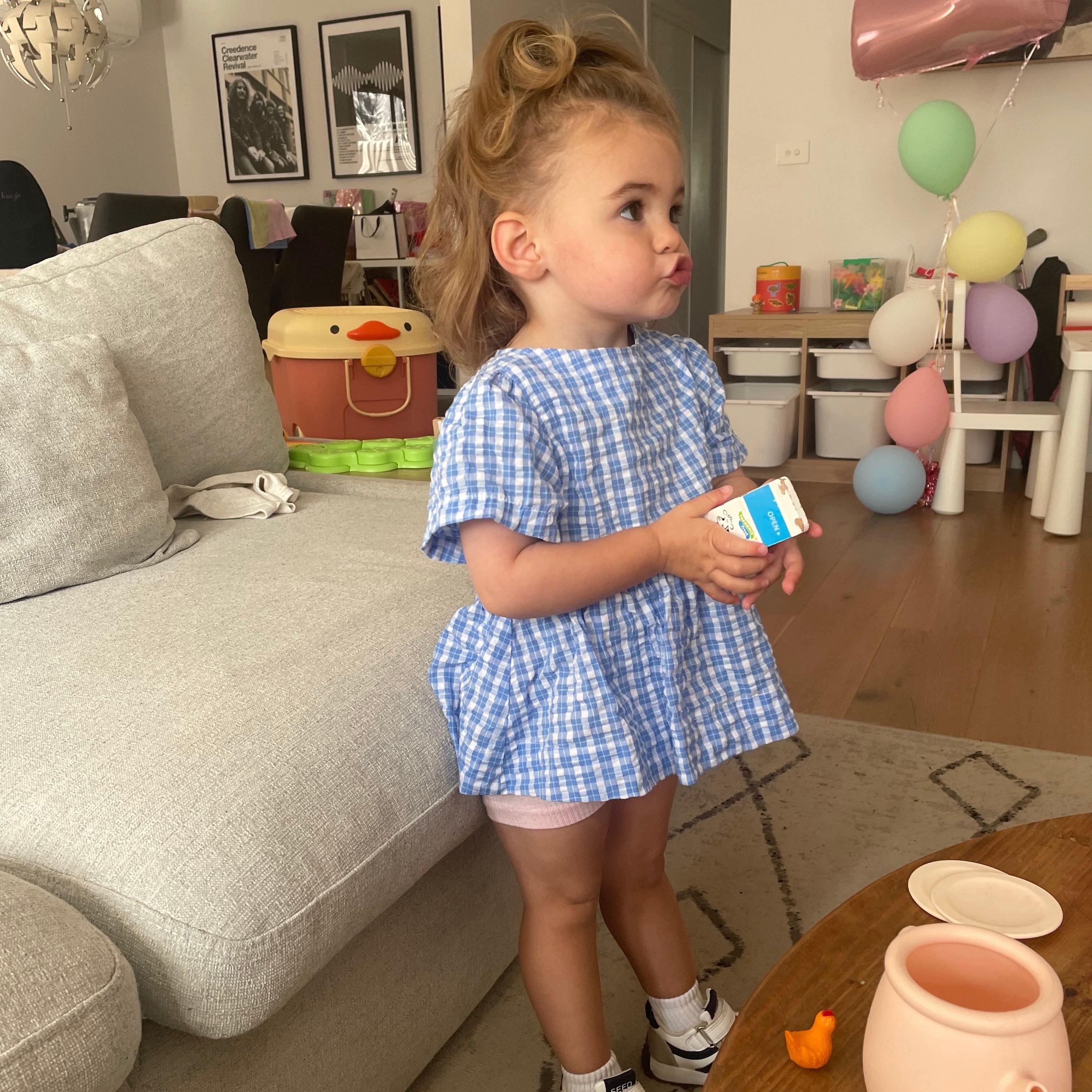 Mackenzie wearing Poppy Top in Bluish Check. Age 2 • Wearing 2-3Y