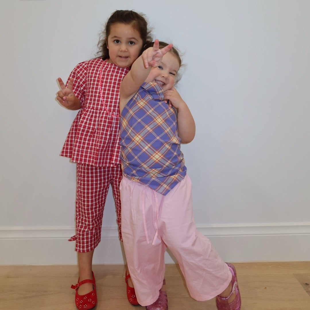 Parker wearing Ari Scarf Top in Iris Check. Age 2 • Wearing 2-3Y