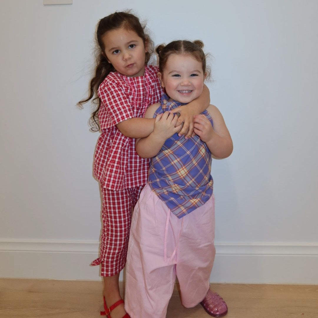 Parker wearing Poppy Top in Ruby Check. Age 2 • Wearing 2-3Y