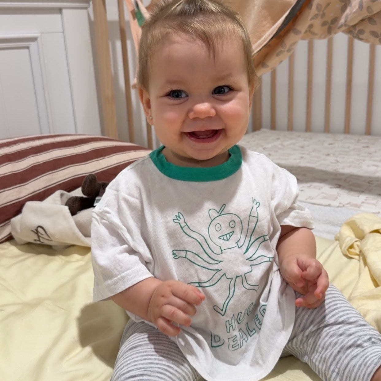 Malia wearing Sofia Tee in Snowie. Age 12-18m • Wearing 6-12m
