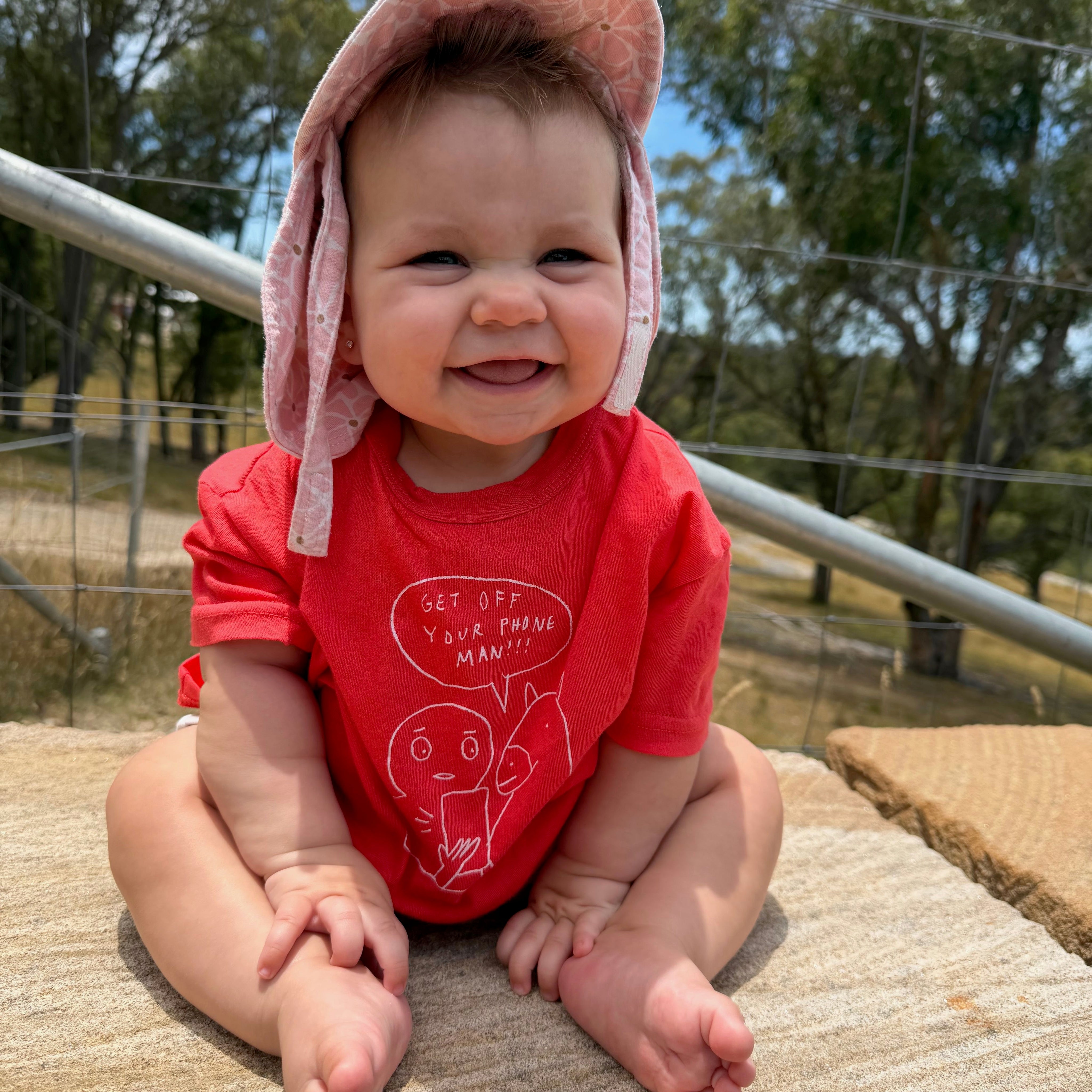 Malia wearing Stewie Tee in Matchstick. Age 12-18m • Wearing 6-12m