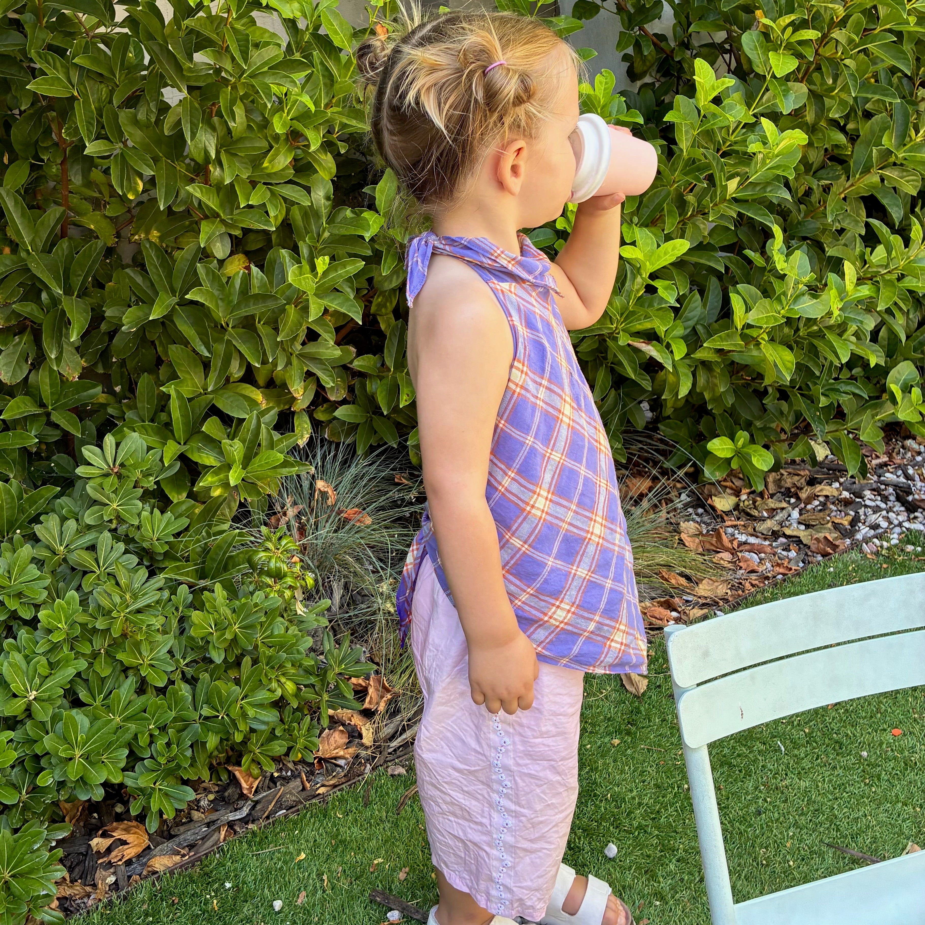 Arli wearing Ari Scarf Top in Iris Check. Age 2 • Wearing 4-5Y